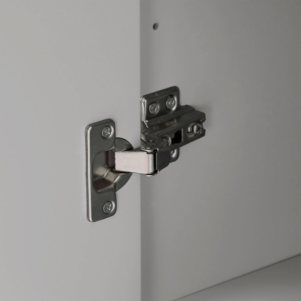 Stainless steel hinge of the grey linen cabinet door.