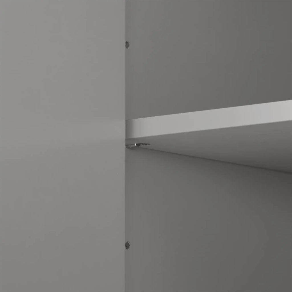 Close-up view of adjustable shelf feature inside grey linen cabinet, highlighting flexible storage setup.